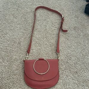 ABLE pinkish/red crossbody bag